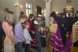 Patriarch Bartholomew greeting young worshipers in Kihnu, Estonia