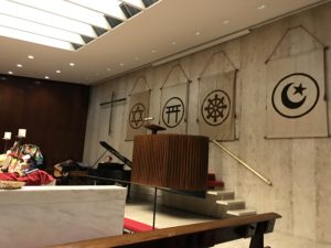 The chapel at the Church Center for the United Nations features banners representing a variety of religious faiths (Photo: Jeff Walton/IRD)