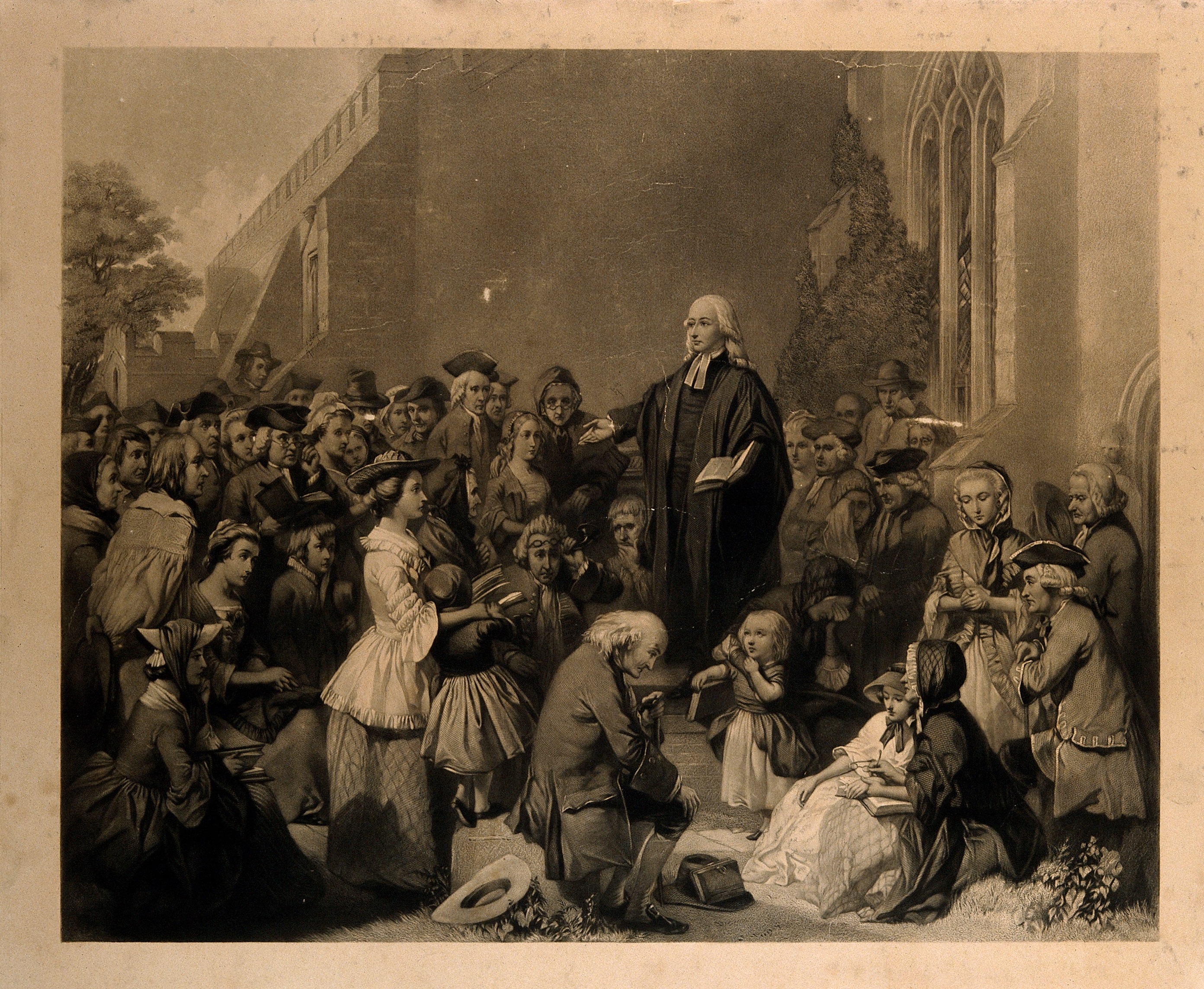 John Wesley preaching to a crowd
