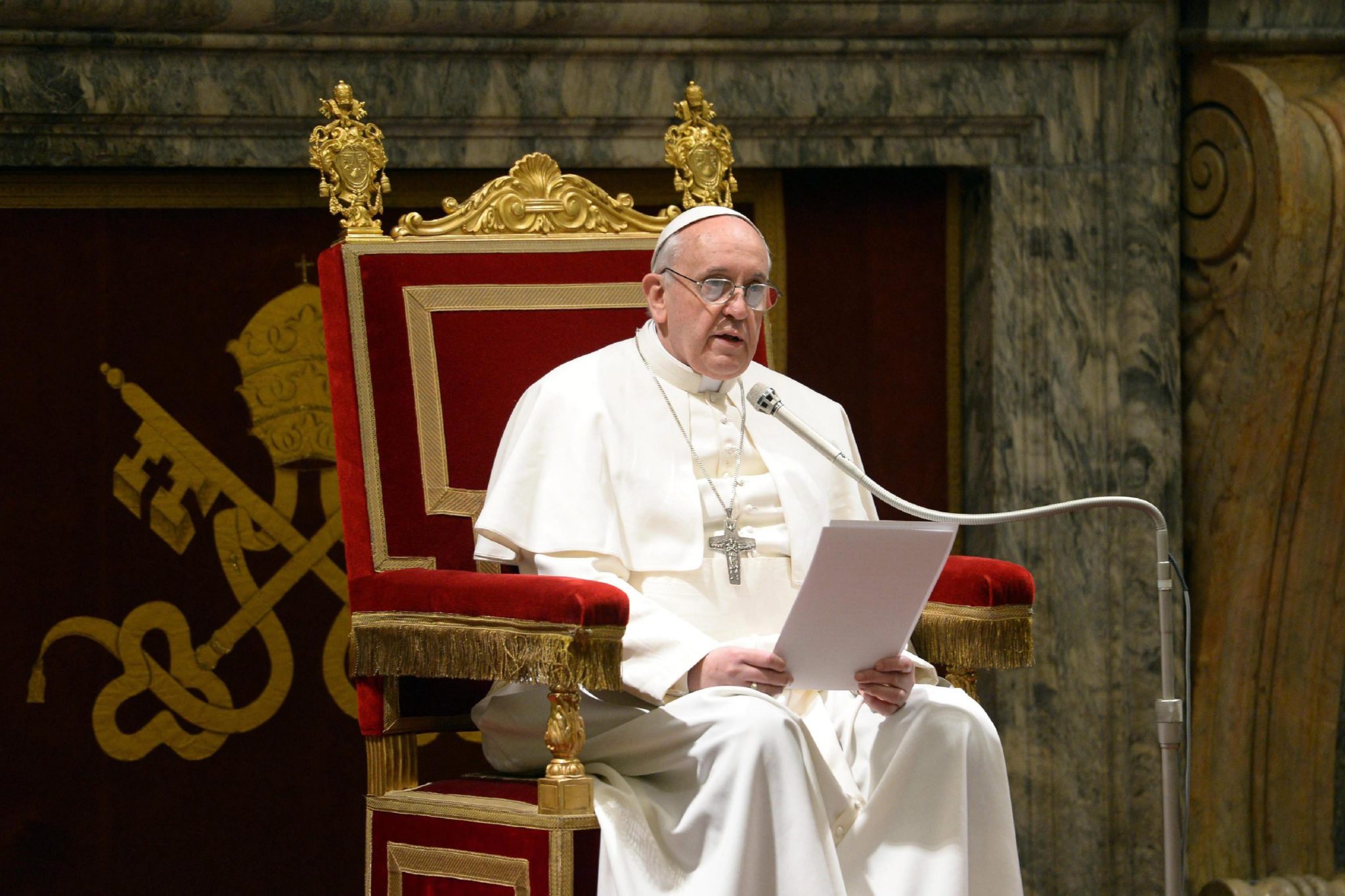 This picture released by the Vatican press office on March 15, 2013 shows Pope Francis delivering a speech during a meeting of the world's cardinals.The new Pontiff urged the Roman Catholic Church not to give in to "pessimism" and to find new ways of spreading the faith "to the ends of the earth".  EPA/Osservatore Romano