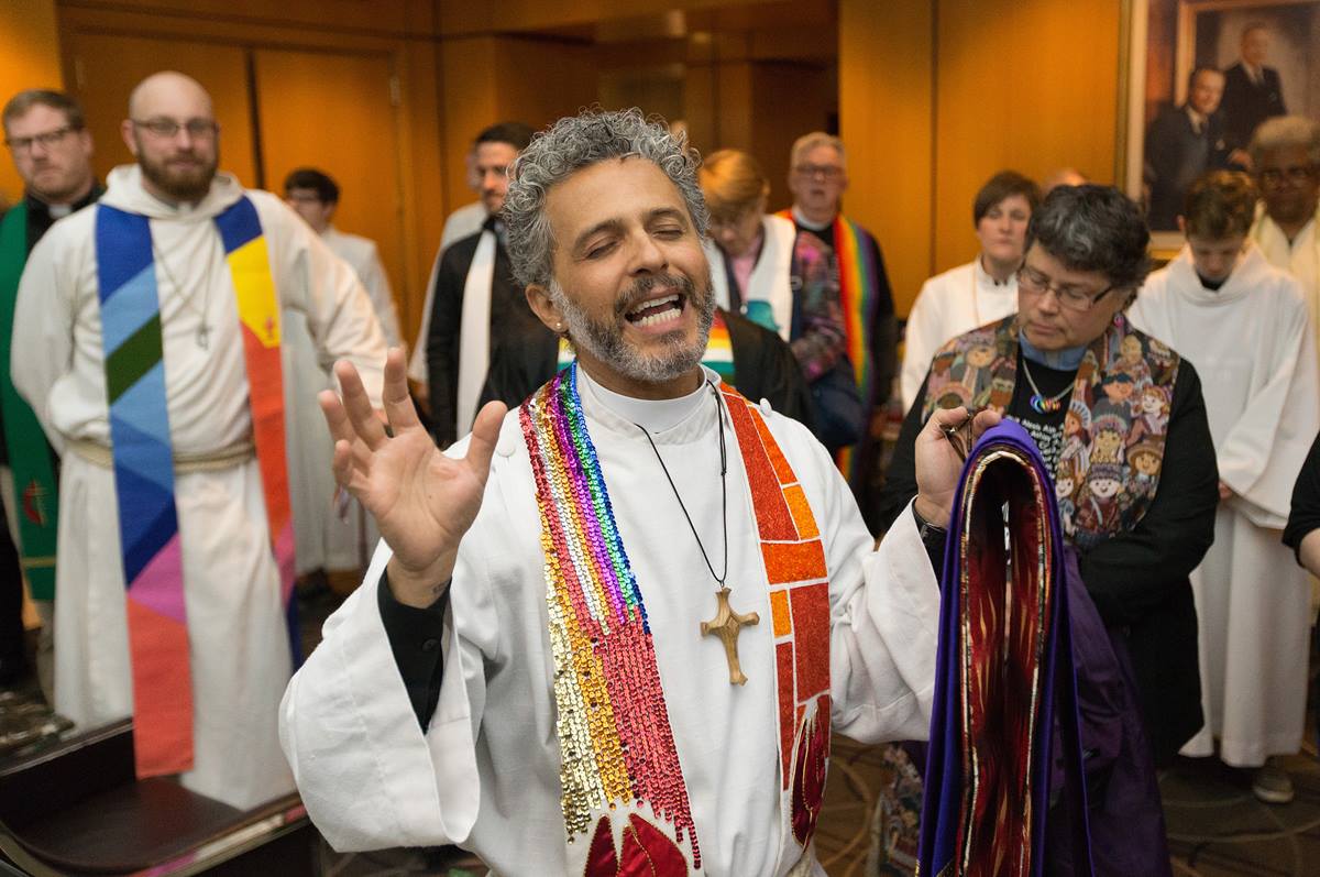 Former Liberation Methodist Connexion organizer Alex da Silva Souto (center) protesting outside a meeting of the UMC Judicial Council.